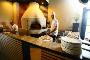 A bona fide wood oven and pizza chef, both from Italy.